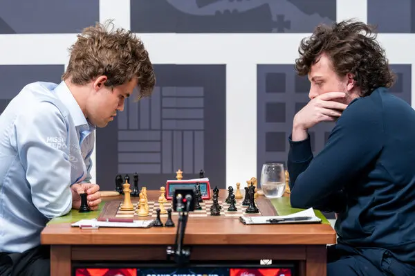 Magnus Carlsen faces off against Hans Niemann.